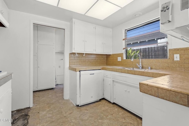 929 Diamond St, Monrovia, CA 91016 - kitchen featuring white dishwasher, white cabinets, light countertops, and backsplash