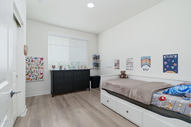 2850 Wagon Wheel Rd Unit 402, Oxnard, CA 93036 - bedroom with light wood-style floors and baseboards