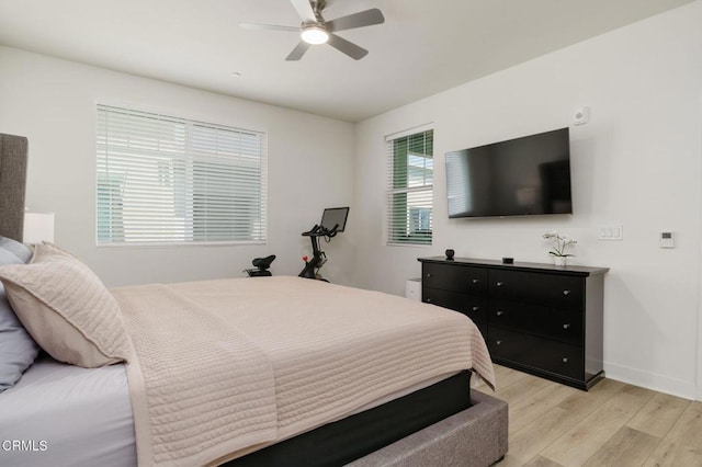 2850 Wagon Wheel Rd Unit 402, Oxnard, CA 93036 - bedroom featuring light wood-style floors and ceiling fan