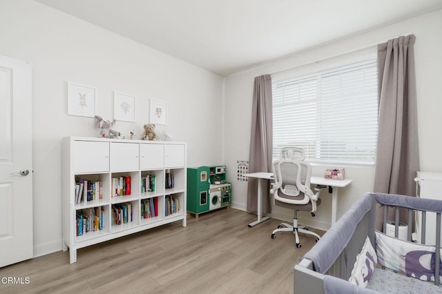 2850 Wagon Wheel Rd Unit 402, Oxnard, CA 93036 - bedroom featuring light wood-type flooring