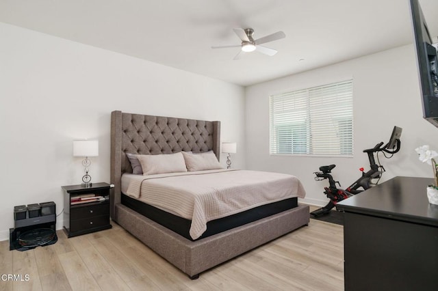 2850 Wagon Wheel Rd Unit 402, Oxnard, CA 93036 - bedroom featuring light wood-style flooring and a ceiling fan