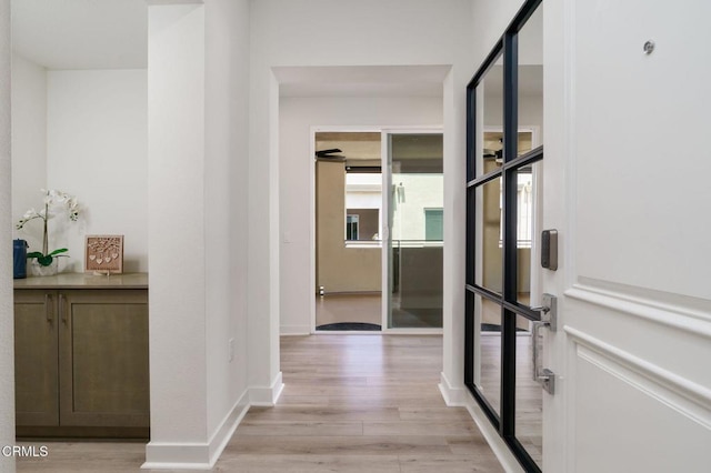 2850 Wagon Wheel Rd Unit 402, Oxnard, CA 93036 - hallway featuring light wood-style floors