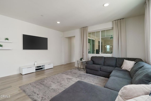 2850 Wagon Wheel Rd Unit 402, Oxnard, CA 93036 - living area with wood finished floors and recessed lighting