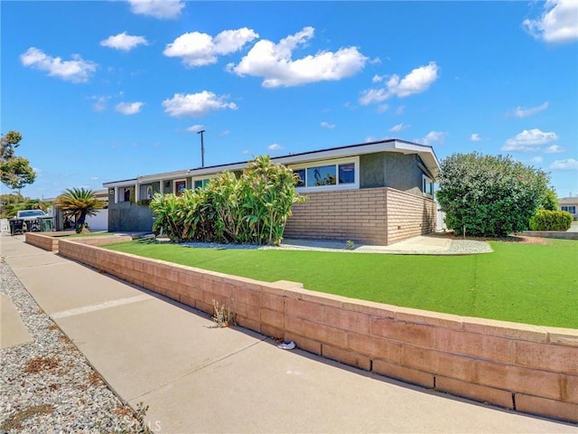 2310 W 169th Pl, Torrance, CA 90504 - view of front of property featuring a front lawn and brick siding