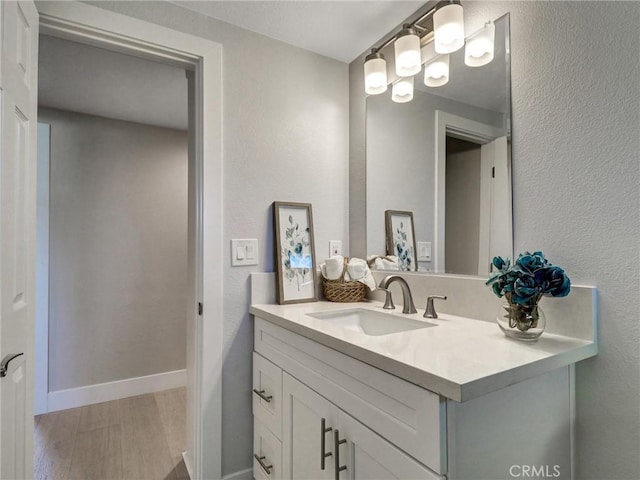 2310 W 169th Pl, Torrance, CA 90504 - bathroom with wood finished floors and vanity