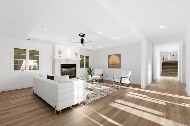 1248 Via Christina, Vista, CA 92084 - living room with a raised ceiling, ceiling fan, stairway, wood finished floors, and recessed lighting