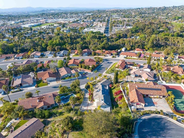 1248 Via Christina, Vista, CA 92084 - aerial overview of property's location with nearby suburban area and mountains