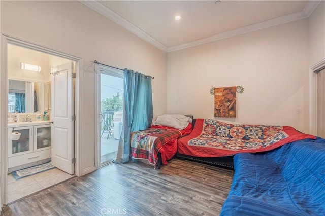 2461 Santa Ana N, Los Angeles, CA 90059 - bedroom featuring access to outside, ornamental molding, wood finished floors, ensuite bathroom, and recessed lighting