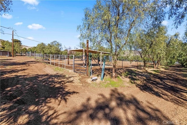 35728 Beauty Vista Ln, Agua Dulce, CA 91390 - view of yard featuring a rural view, an exterior structure, and an outbuilding