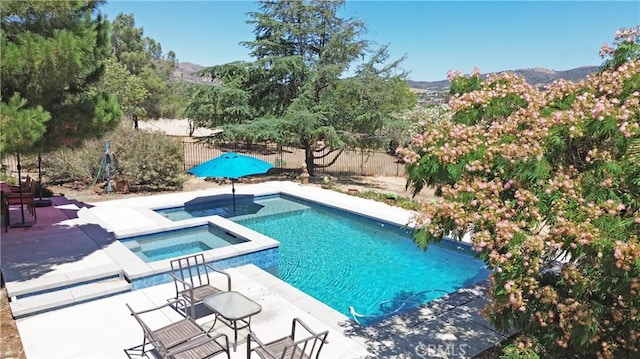 35728 Beauty Vista Ln, Agua Dulce, CA 91390 - view of swimming pool with a mountain view, a fenced backyard, a patio area, and a pool with connected hot tub