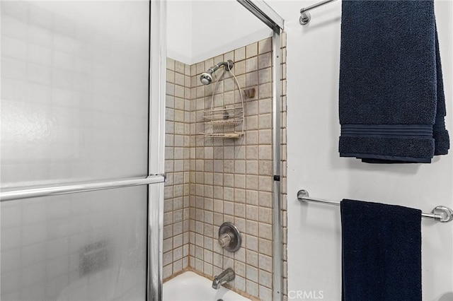 603 Reed Park Dr, Chico, CA 95926 - bathroom featuring bath / shower combo with glass door