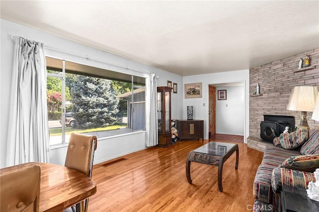 603 Reed Park Dr, Chico, CA 95926 - living area with a wood stove and wood finished floors