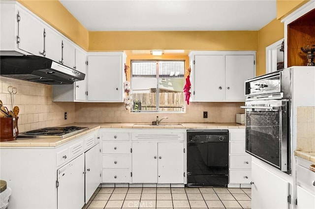 603 Reed Park Dr, Chico, CA 95926 - kitchen with dishwasher, under cabinet range hood, wall oven, electric cooktop, and white cabinetry