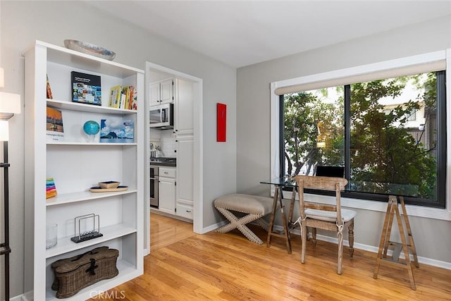 270 N Orange Grove Blvd, Pasadena, CA 91103 - dining area with light wood-type flooring and baseboards