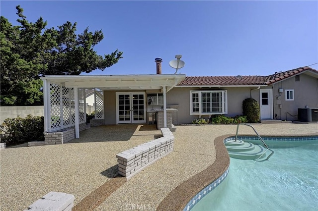 18342 Piper Pl, Yorba Linda, CA 92886 - rear view of property with stucco siding, french doors, and a patio area