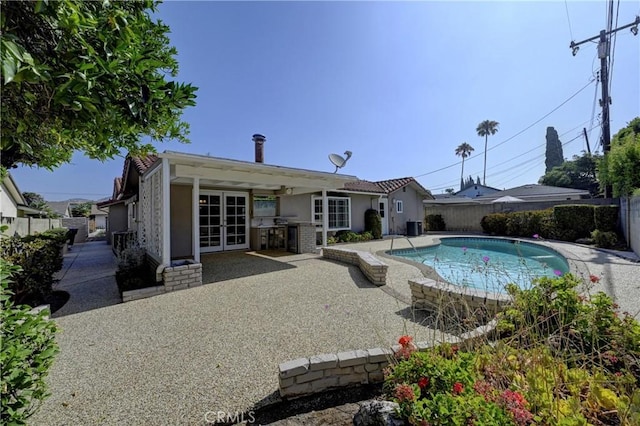 18342 Piper Pl, Yorba Linda, CA 92886 - view of swimming pool with french doors, a fenced backyard, a patio area, and area for grilling