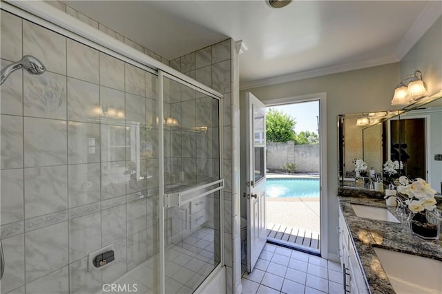 18342 Piper Pl, Yorba Linda, CA 92886 - bathroom featuring double vanity, crown molding, a shower stall, and tile patterned floors