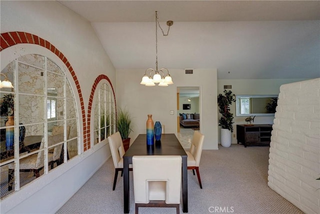 18342 Piper Pl, Yorba Linda, CA 92886 - carpeted dining space featuring a chandelier and vaulted ceiling