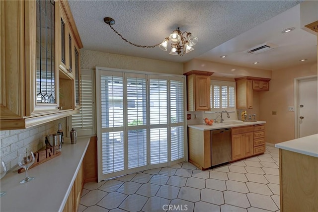 18342 Piper Pl, Yorba Linda, CA 92886 - kitchen featuring dishwasher, light countertops, a textured ceiling, backsplash, and ceiling fan