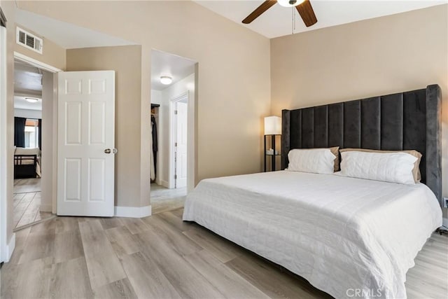 12411 Osborne St Unit 17, Pacoima, CA 91331 - bedroom with wood finished floors and a ceiling fan