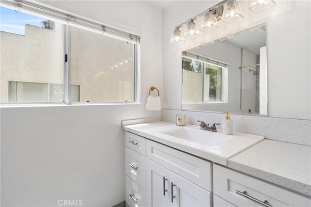 12411 Osborne St Unit 17, Pacoima, CA 91331 - bathroom with vanity and a shower
