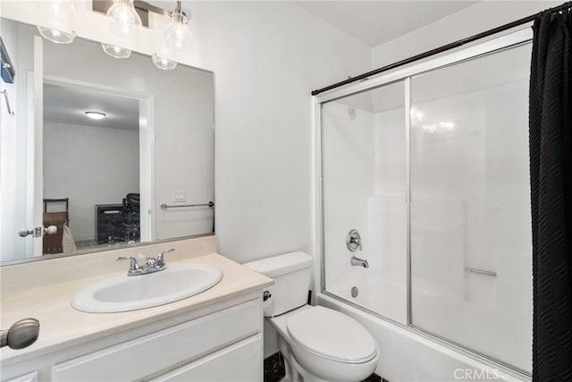 12411 Osborne St Unit 17, Pacoima, CA 91331 - bathroom featuring vanity, combined bath / shower with glass door, and ensuite bath
