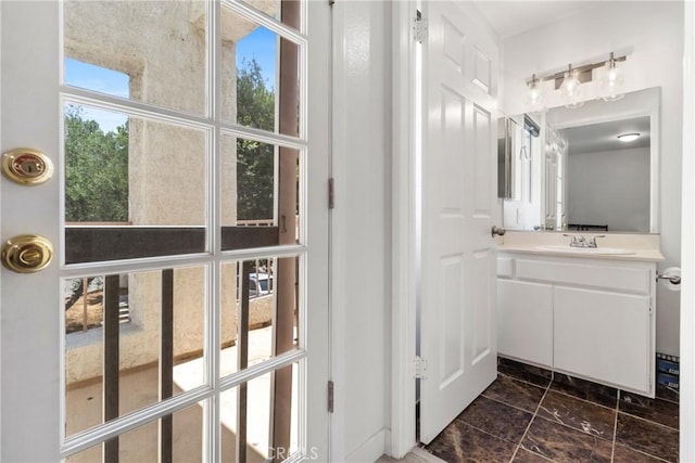 12411 Osborne St Unit 17, Pacoima, CA 91331 - bathroom with vanity and marble look tile flooring