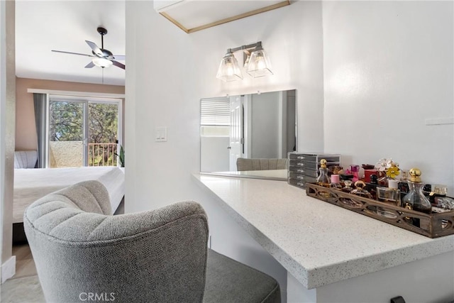 12411 Osborne St Unit 17, Pacoima, CA 91331 - kitchen featuring a ceiling fan and light stone countertops