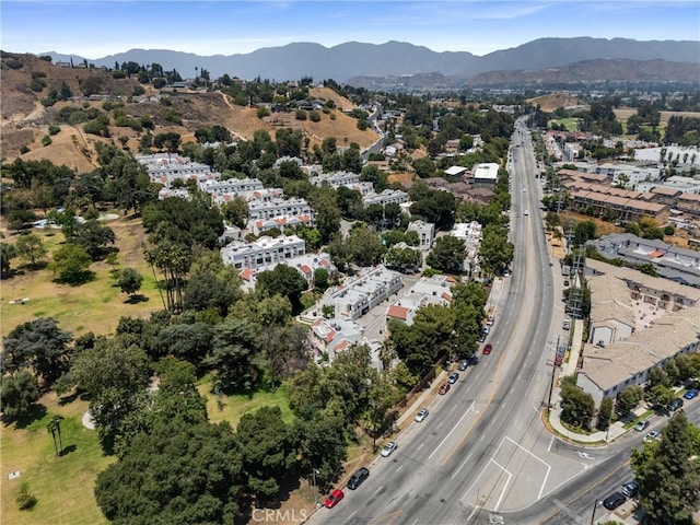 12411 Osborne St Unit 17, Pacoima, CA 91331 - aerial view of property and surrounding area featuring a highway and a mountainous background