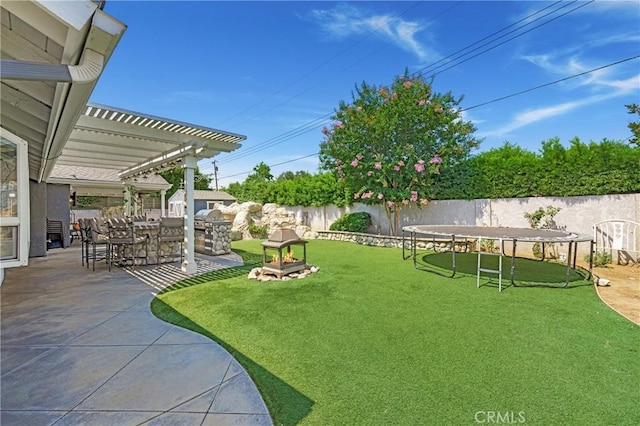 4441 Rustic Rd, Yorba Linda, CA 92886 - fenced backyard with a trampoline, a patio, and a pergola