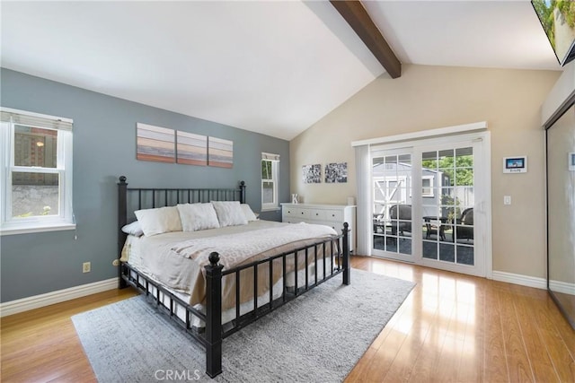 4441 Rustic Rd, Yorba Linda, CA 92886 - bedroom with beam ceiling, access to outside, light wood-style flooring, and high vaulted ceiling