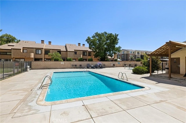 1832 E E Ave J2, Unit 2, Lancaster, CA 93535 - community pool featuring a patio area and a residential view