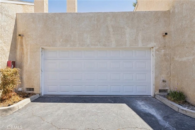 1832 E E Ave J2, Unit 2, Lancaster, CA 93535 - garage featuring driveway