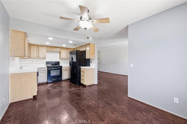 1832 E E Ave J2, Unit 2, Lancaster, CA 93535 - kitchen featuring black appliances, light brown cabinets, ceiling fan, light countertops, and dark wood finished floors