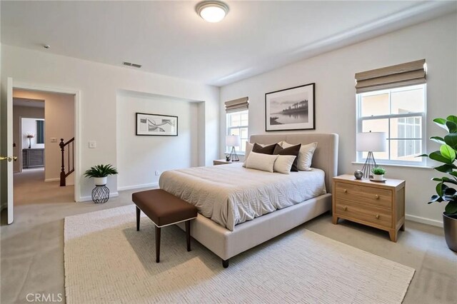 8656 Harvest Pl, Rancho Cucamonga, CA 91730 - bedroom featuring light colored carpet and baseboards