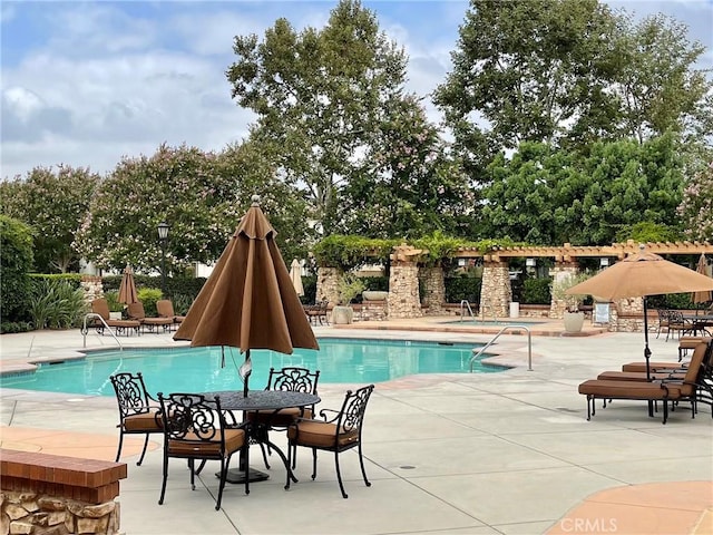 8656 Harvest Pl, Rancho Cucamonga, CA 91730 - community pool with a patio and a hot tub