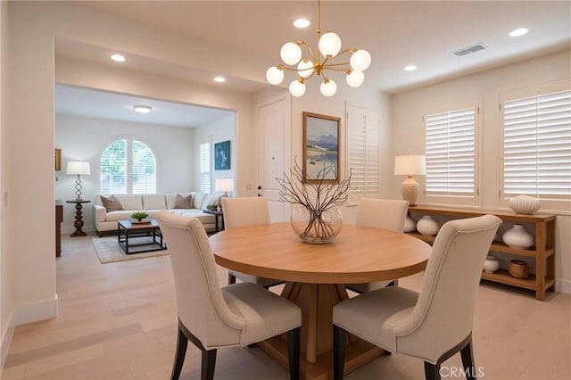 8656 Harvest Pl, Rancho Cucamonga, CA 91730 - dining room featuring recessed lighting, a chandelier, and light wood-style floors