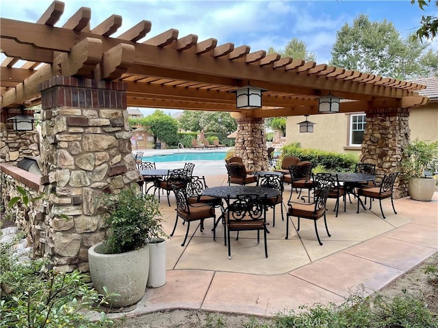 8656 Harvest Pl, Rancho Cucamonga, CA 91730 - view of patio with an outdoor pool, a pergola, and outdoor dining space