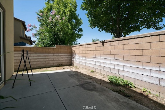 8656 Harvest Pl, Rancho Cucamonga, CA 91730 - fenced backyard featuring a patio