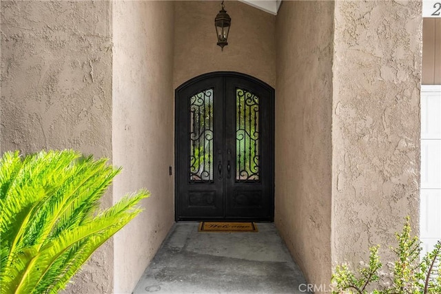 2405 E Alicia St, West Covina, CA 91792 - entrance to property with french doors and stucco siding