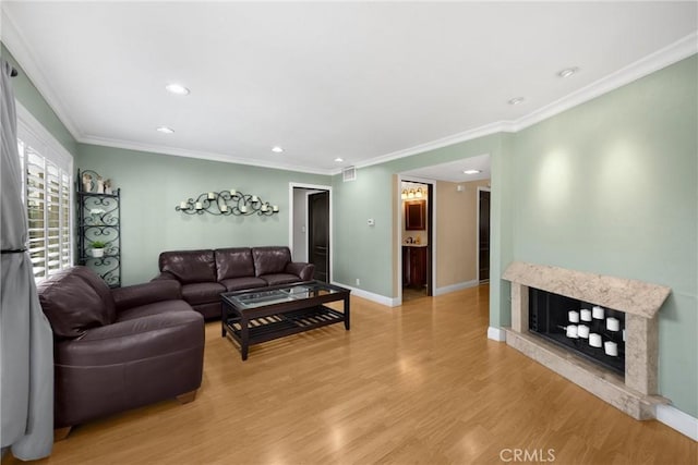 2405 E Alicia St, West Covina, CA 91792 - living area featuring recessed lighting, light wood finished floors, and ornamental molding