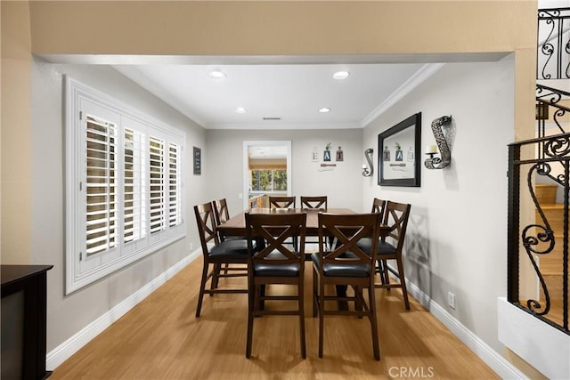 2405 E Alicia St, West Covina, CA 91792 - dining area with wood finished floors, crown molding, and recessed lighting