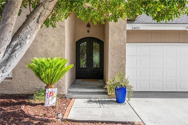 2405 E Alicia St, West Covina, CA 91792 - property entrance with stucco siding and roof with shingles