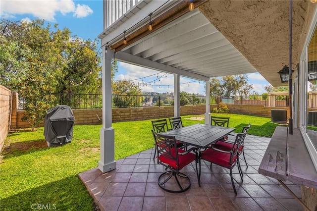 2405 E Alicia St, West Covina, CA 91792 - fenced backyard featuring a grill, outdoor dining space, and a patio area