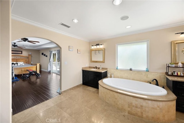 2405 E Alicia St, West Covina, CA 91792 - bathroom with vanity, a garden tub, ornamental molding, ceiling fan, and recessed lighting