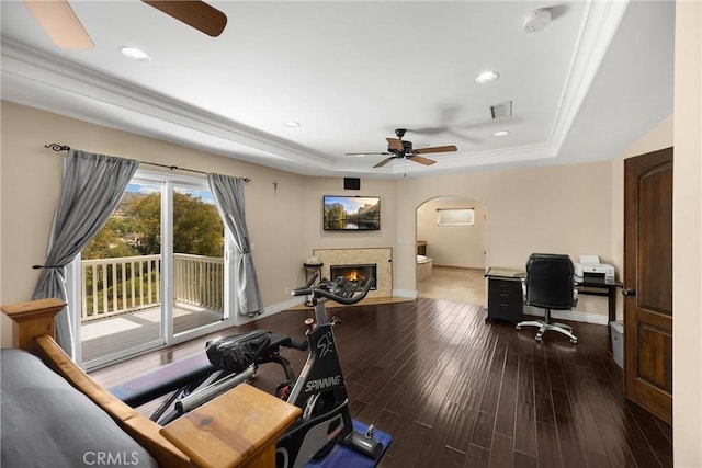 2405 E Alicia St, West Covina, CA 91792 - office space with a ceiling fan, a raised ceiling, arched walkways, a warm lit fireplace, and recessed lighting