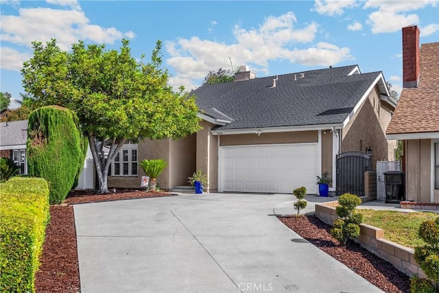 2405 E Alicia St, West Covina, CA 91792 - view of front of property with driveway, a chimney, an attached garage, and stucco siding