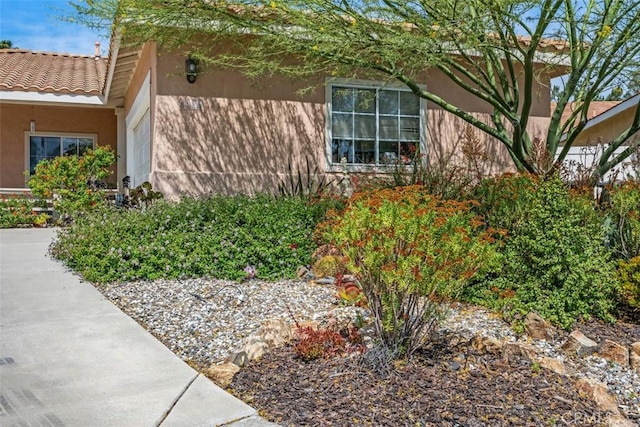41791 Corte Lara, Temecula, CA 92592 - view of home's exterior with stucco siding and a tiled roof