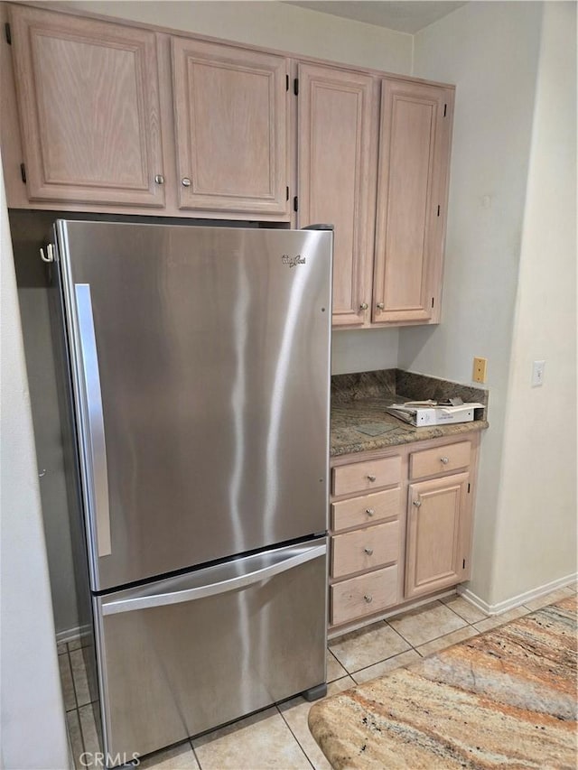 41791 Corte Lara, Temecula, CA 92592 - kitchen with freestanding refrigerator, light brown cabinets, and light tile patterned flooring
