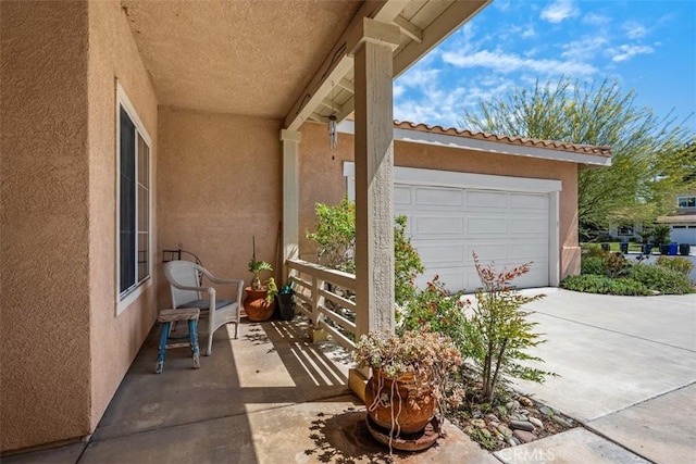 41791 Corte Lara, Temecula, CA 92592 - view of patio with driveway and an attached garage